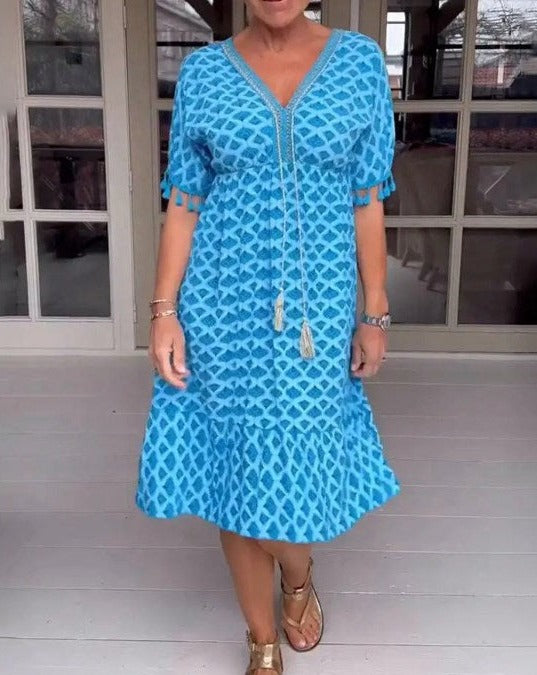 JO | Comfortable, loose-fitting midi dress with V-neckline