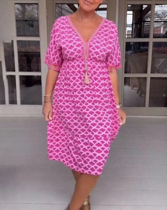 JO | Comfortable, loose-fitting midi dress with V-neckline