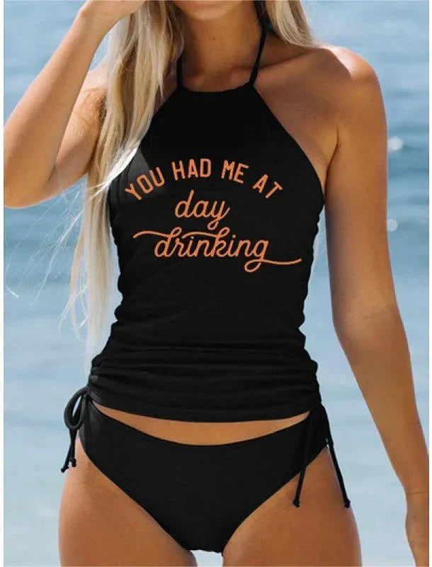 JO | Stylish black halterneck swimsuit with print