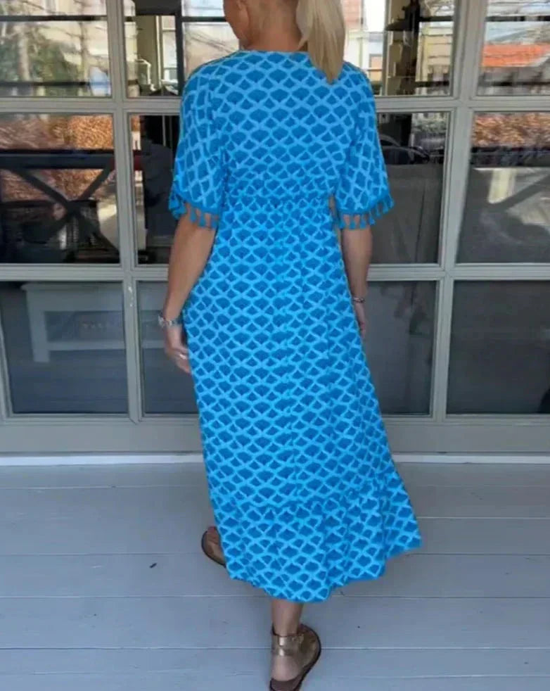 JO | Comfortable, loose-fitting midi dress with V-neckline