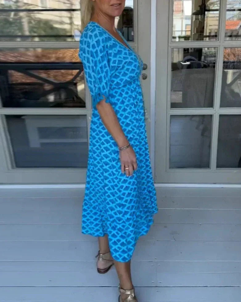 JO | Comfortable, loose-fitting midi dress with V-neckline