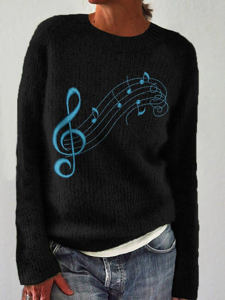 JO | Comfortable and chic sweater with notes design