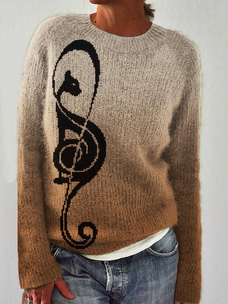 JO | Comfortable and chic sweater with notes design