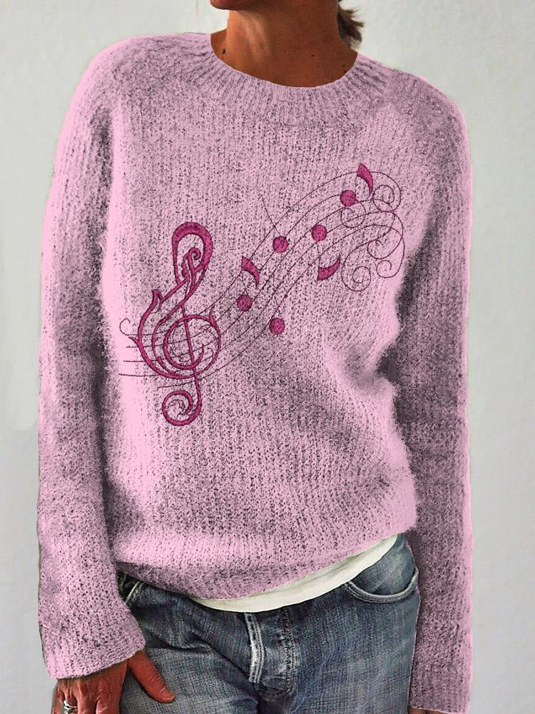 JO | Comfortable and chic sweater with notes design