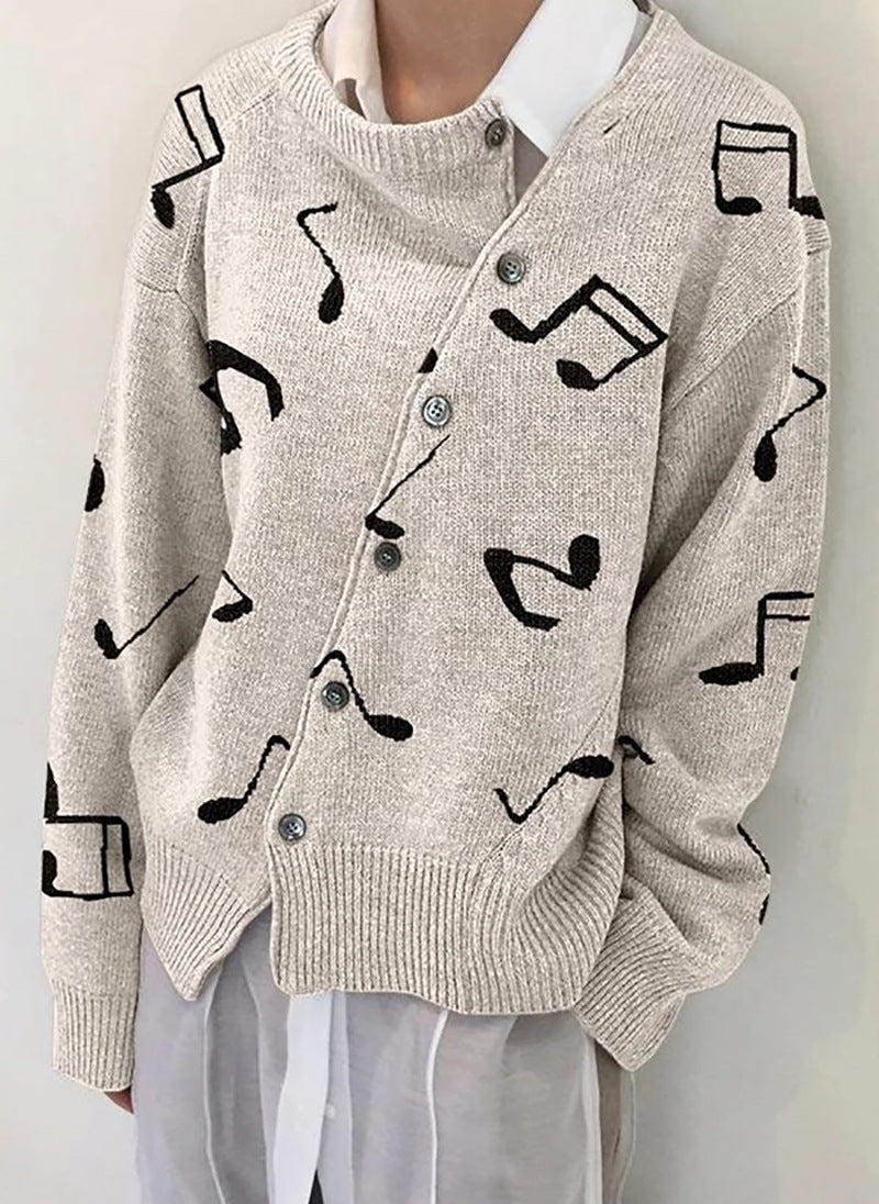 JO | Fashionable cotton sweater with buttons and patterned notes