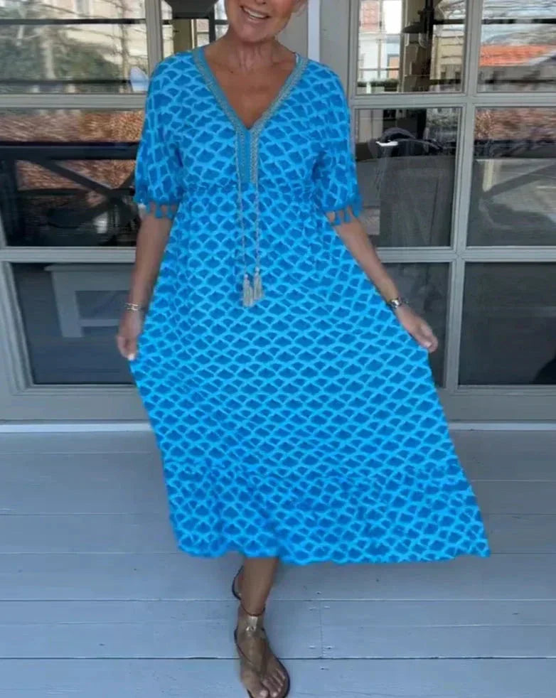 JO | Comfortable, loose-fitting midi dress with V-neckline