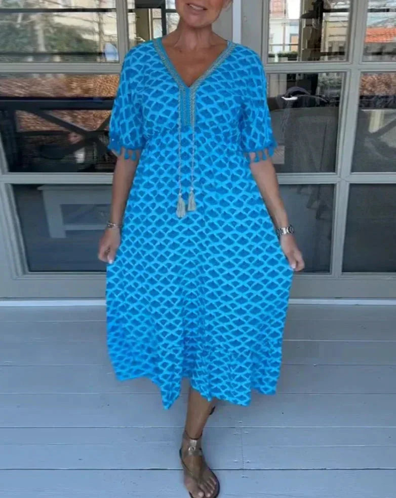 JO | Comfortable, loose-fitting midi dress with V-neckline