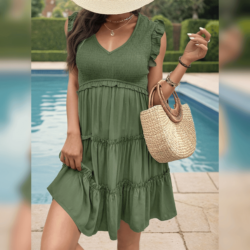JO | Relaxed green mini dress with tiers for your summer vacation