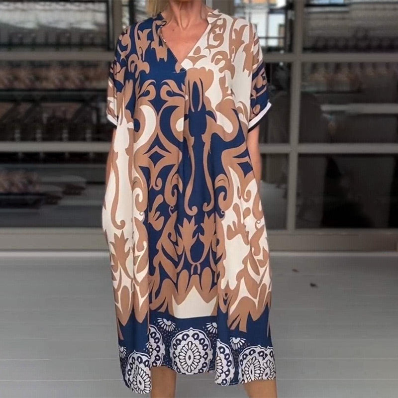 JO | Tight-fitting midi dress with elegant print pattern