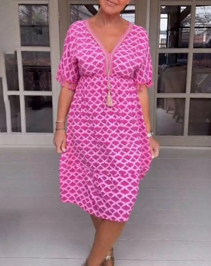JO | Comfortable, loose-fitting midi dress with V-neckline