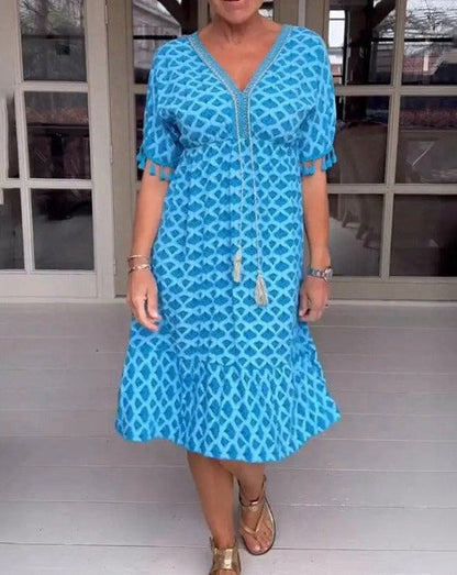 JO | Comfortable, loose-fitting midi dress with V-neckline