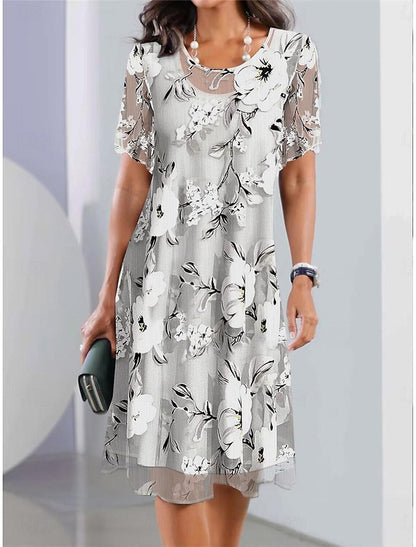 JO | Pleated midi dress with floral print for an elegant and comfortable style