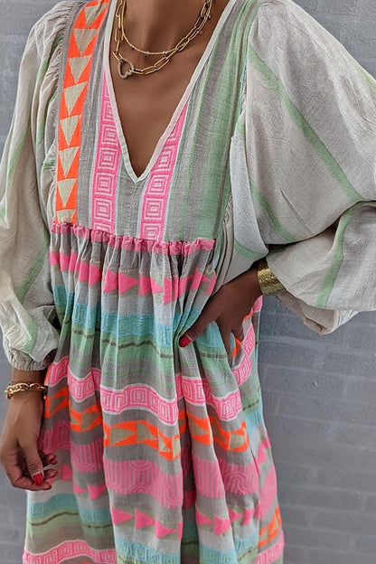 JO | Pink striped midi dress with Greek key and orange necklace