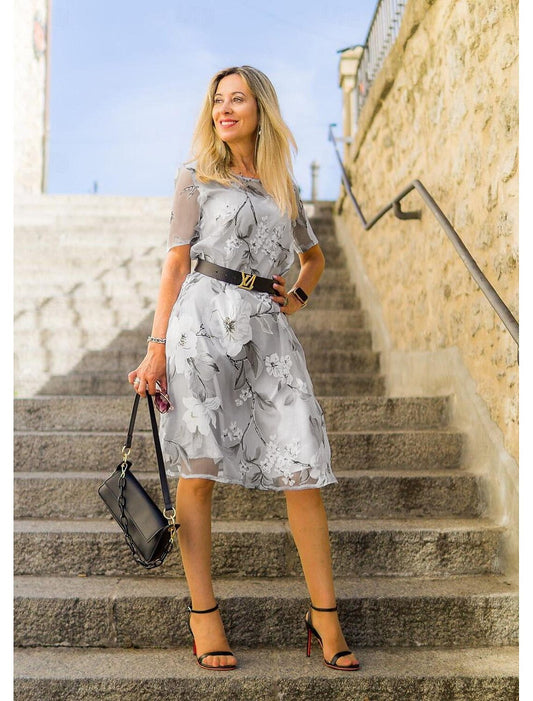 JO | Pleated midi dress with floral print for an elegant and comfortable style