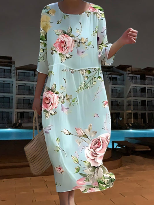 JO | Elegant midi dress made of light, flowing material, 3/4 sleeves with floral print