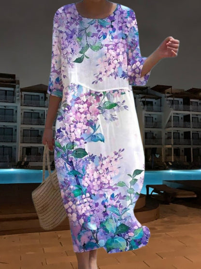 JO | Elegant midi dress made of light, flowing material, 3/4 sleeves with floral print