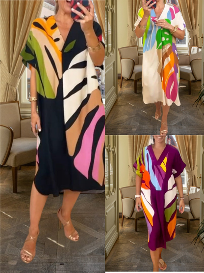 JO | Vibrant cotton blend midi dress with a V-neckline and short sleeves, ideal for spring and summer