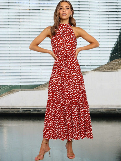 JO | Playful midi dress with polka dots and waist belt