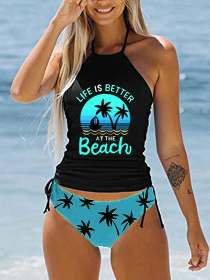 JO | Stylish black halterneck swimsuit with print