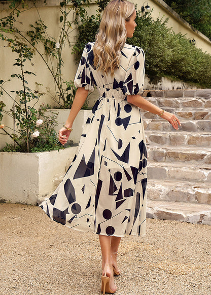 JO | Flattering midi dress with floral pattern