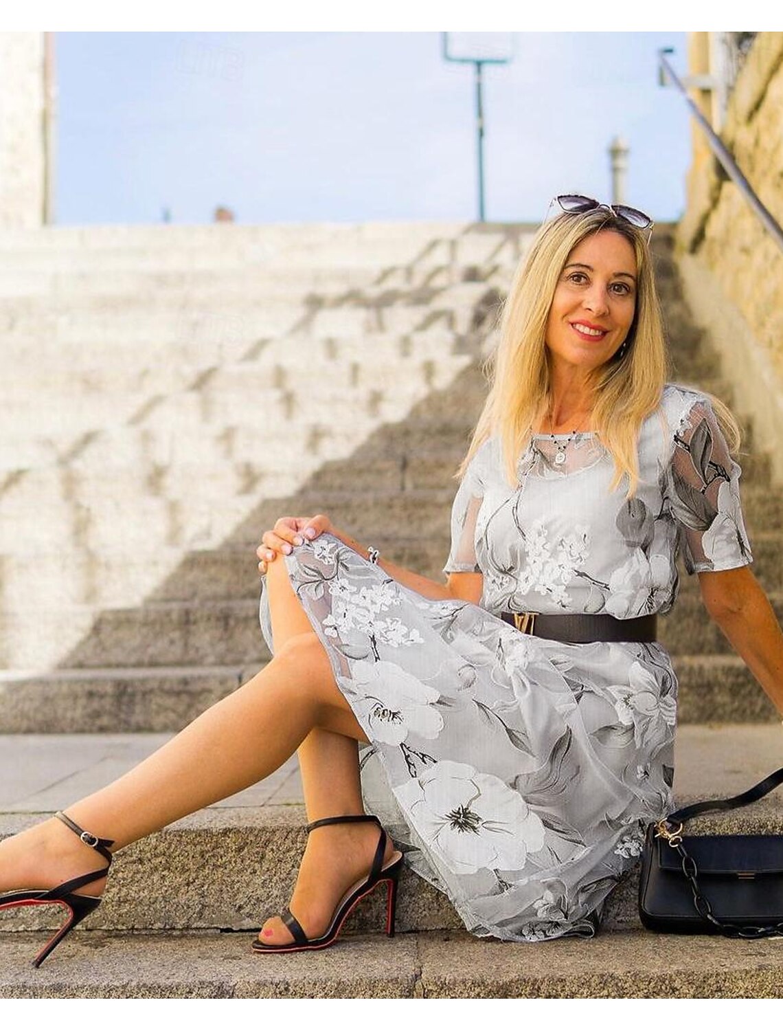 JO | Pleated midi dress with floral print for an elegant and comfortable style