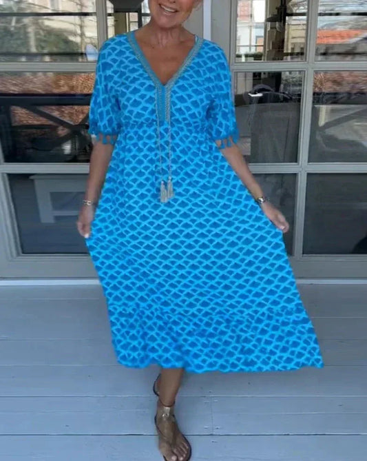 JO | Comfortable, loose-fitting midi dress with V-neckline