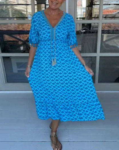 JO | Comfortable, loose-fitting midi dress with V-neckline