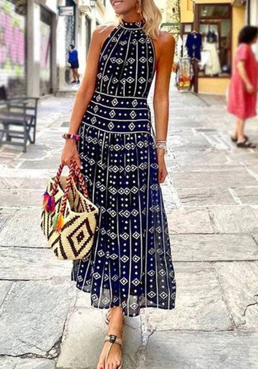 JO | Sleeveless maxi dress with printed halterneck neckline