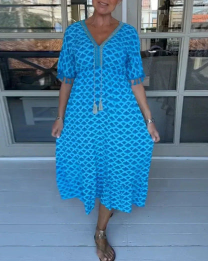 JO | Comfortable, loose-fitting midi dress with V-neckline