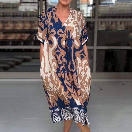 JO | Tight-fitting midi dress with elegant print pattern