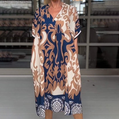 JO | Tight-fitting midi dress with elegant print pattern