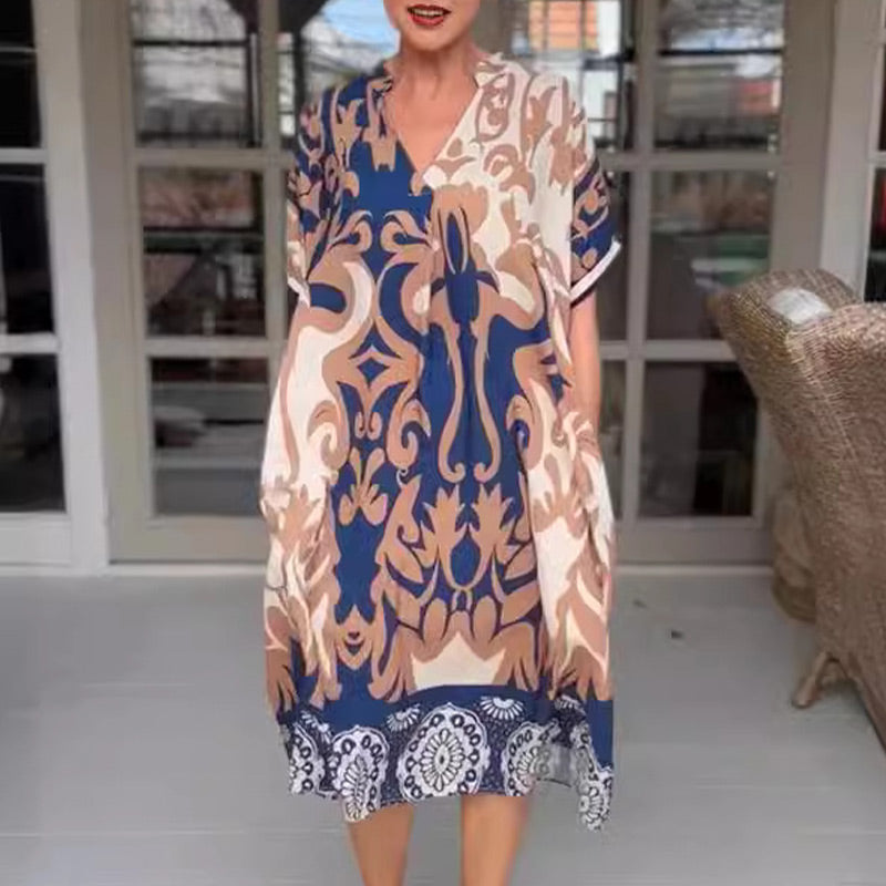 JO | Tight-fitting midi dress with elegant print pattern