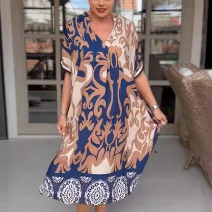 JO | Tight-fitting midi dress with elegant print pattern